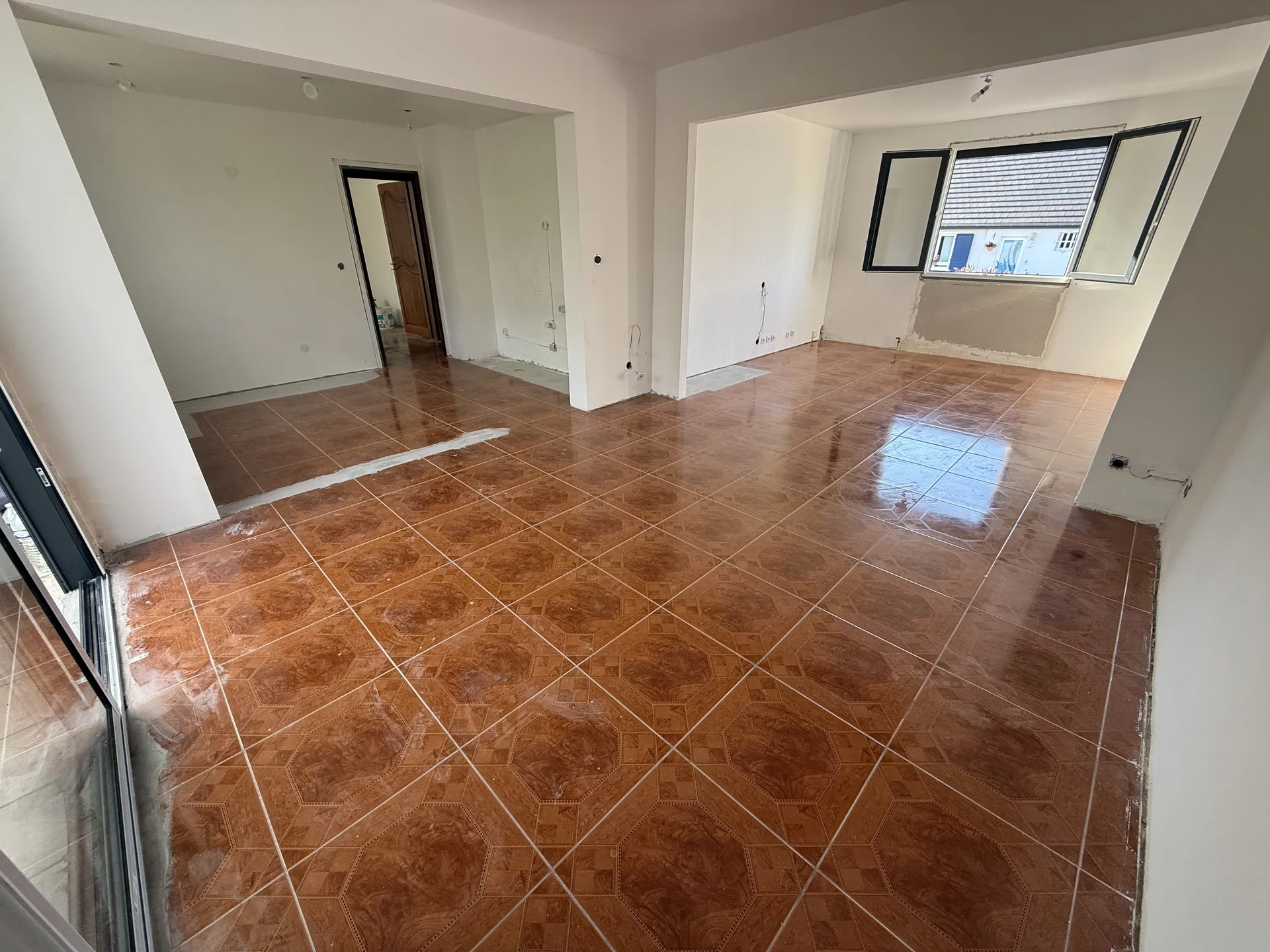 Parquet flottant sur carrelage à Freyming — Avant